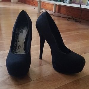 Black suede pumps